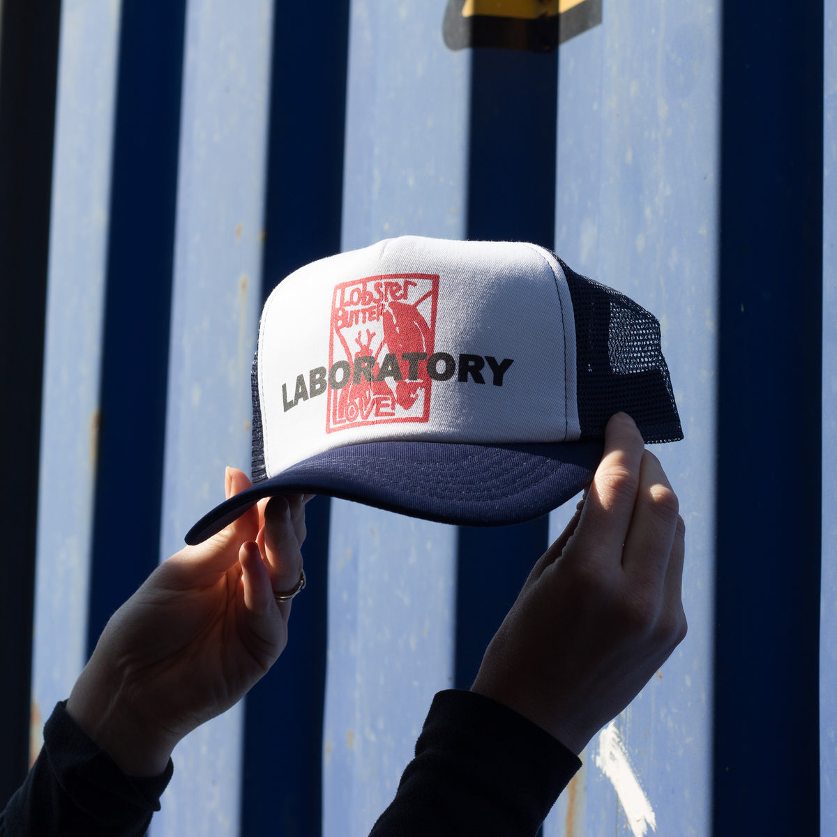 Lobster Butter Laboratory Trucker Hat