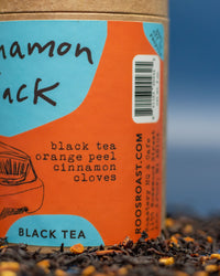 Cinnamon black tea packaging with text and branding details.