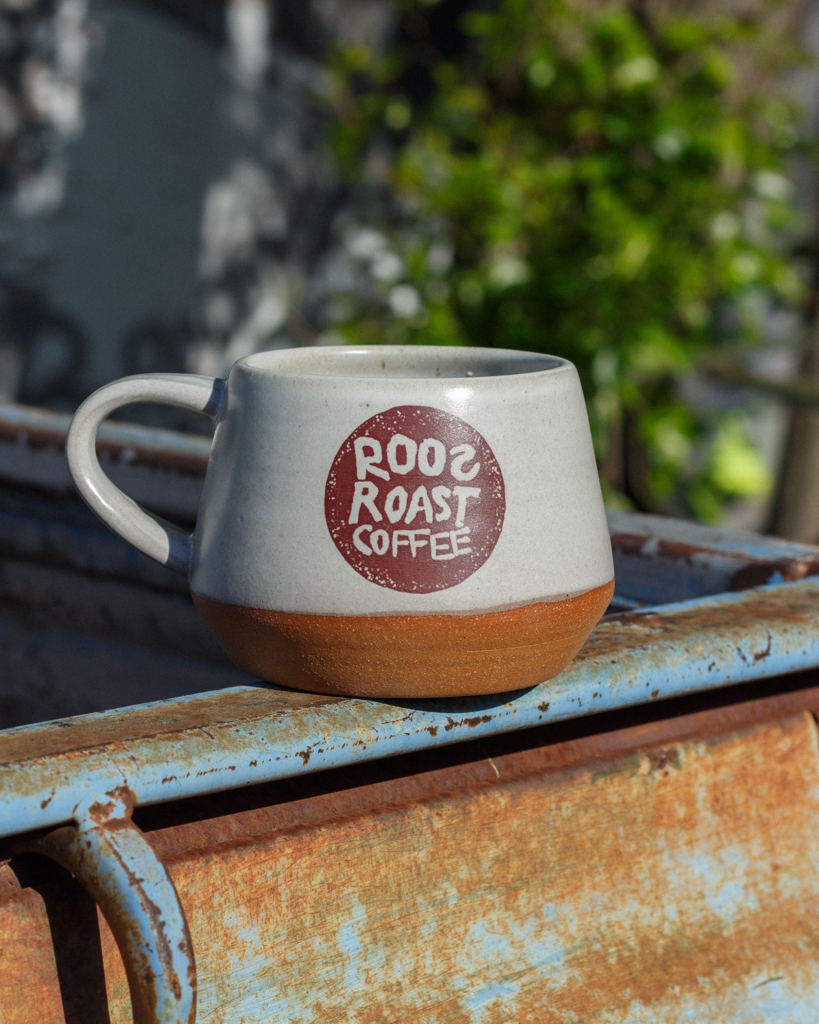 mug with roosroast logo