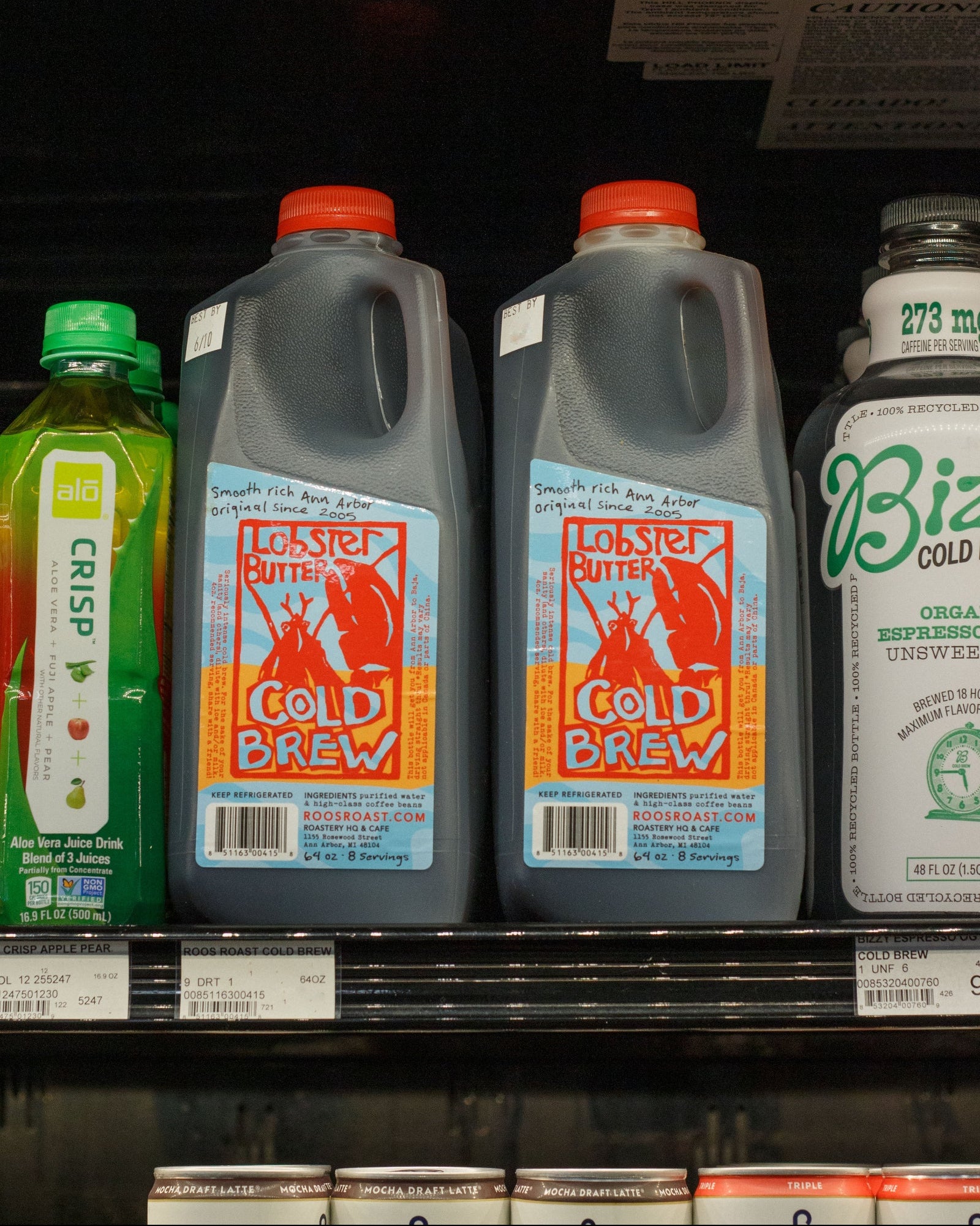 Two bottles of Loblaws Cold Brew on a store shelf with other products.