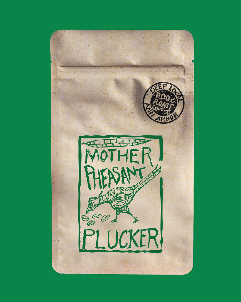 Coffee packaging with 'Mother Pheasant Plucker' branding on a green background