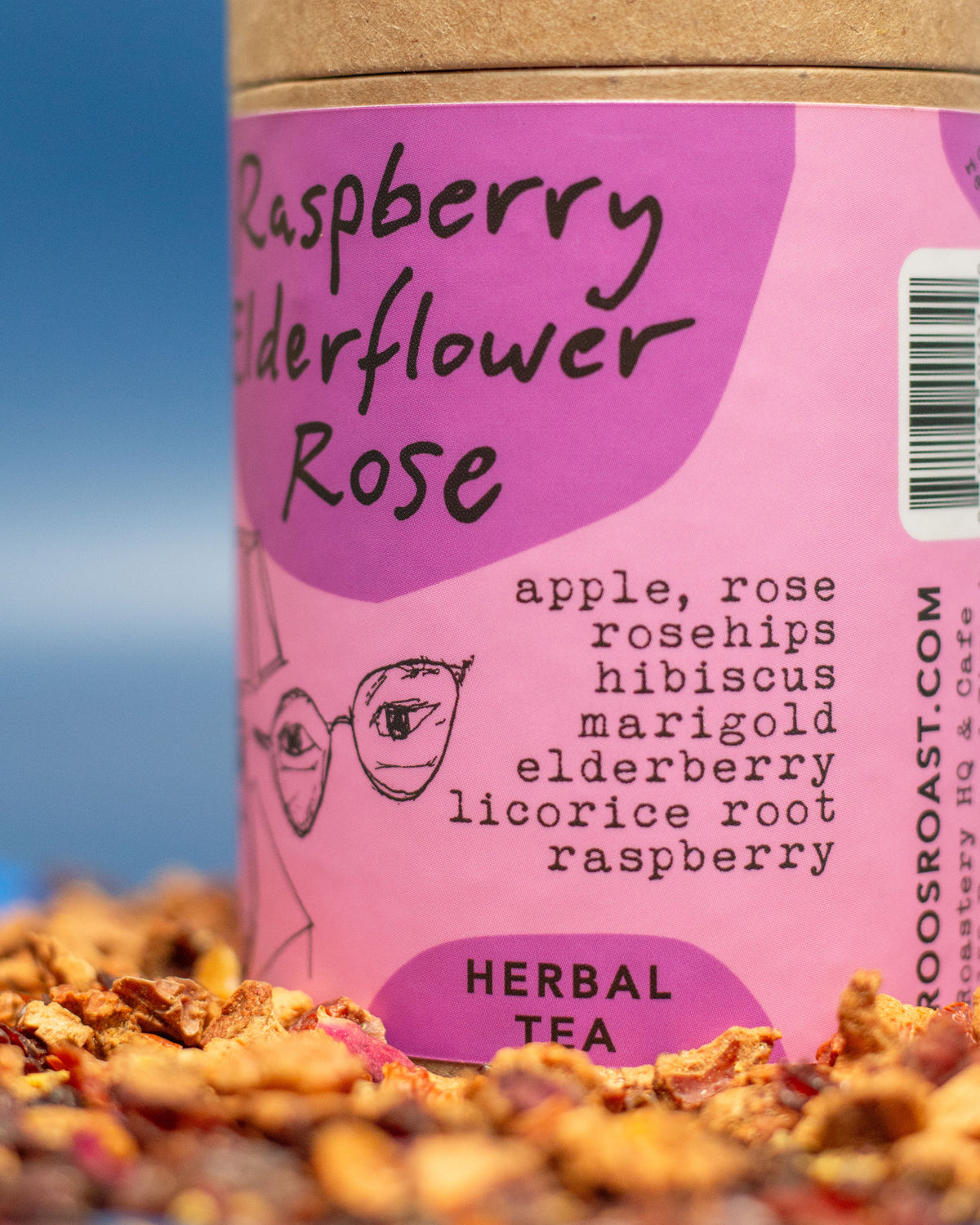 Tea packaging with 'Raspberry Elderflower Rose' flavor and a pink label.