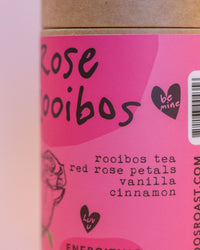 Rooibos tea packaging with pink label and text