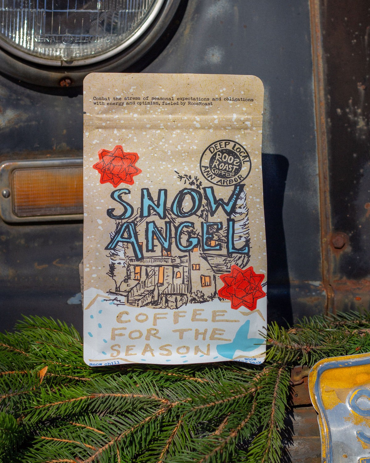 snow angel with bows on the bag