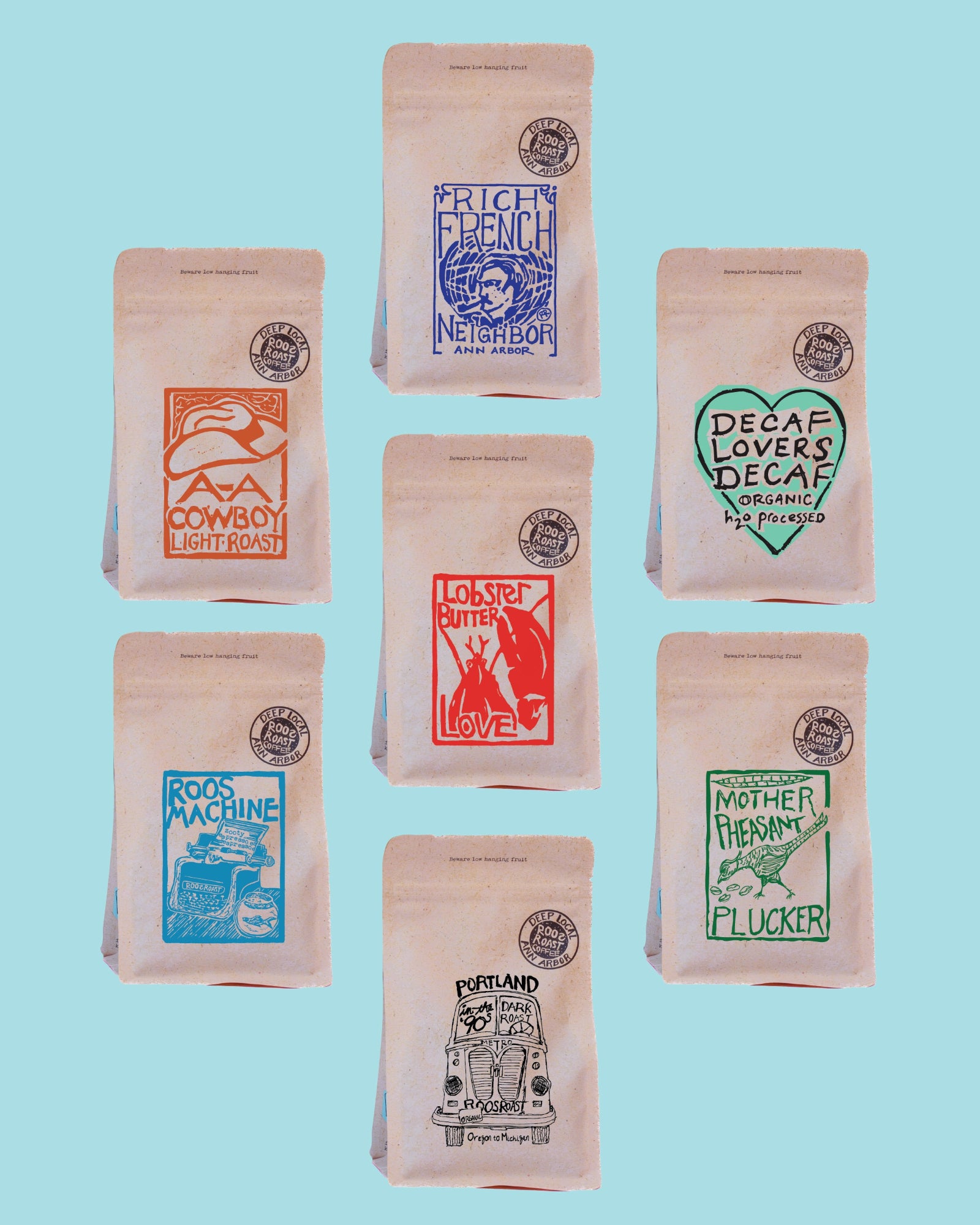 Seven kraft paper coffee bags arranged in a grid on a light blue background, each with a different colorful printed label and circular brand seal.