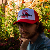red lobster butter love laboratory red trucker hat by roosroast coffee